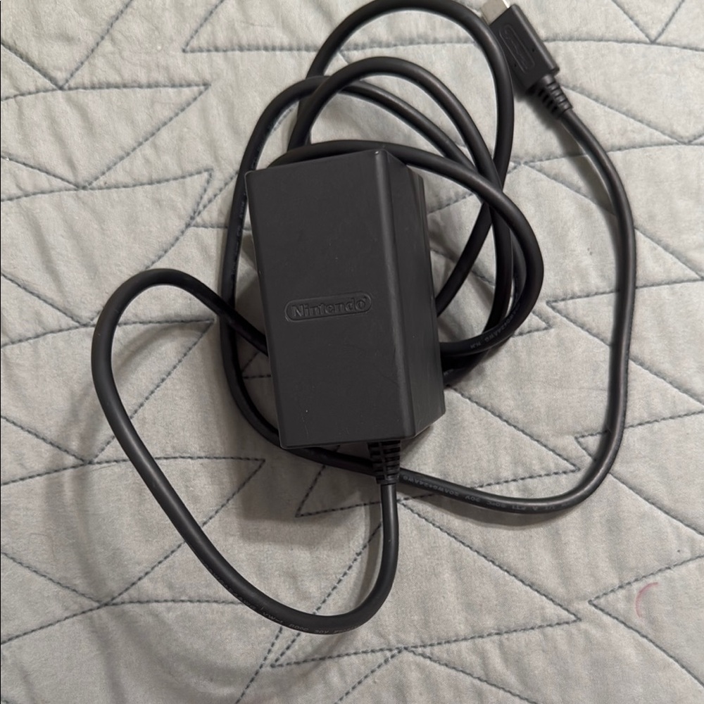 Nintendo Black Console Power Adapter with Long Cable and Compact Design